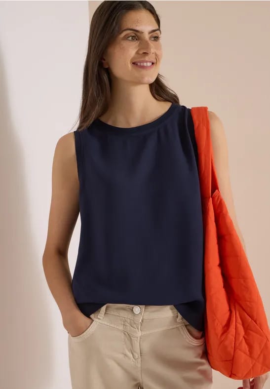 Blouse met ronde hals en geribbelde details