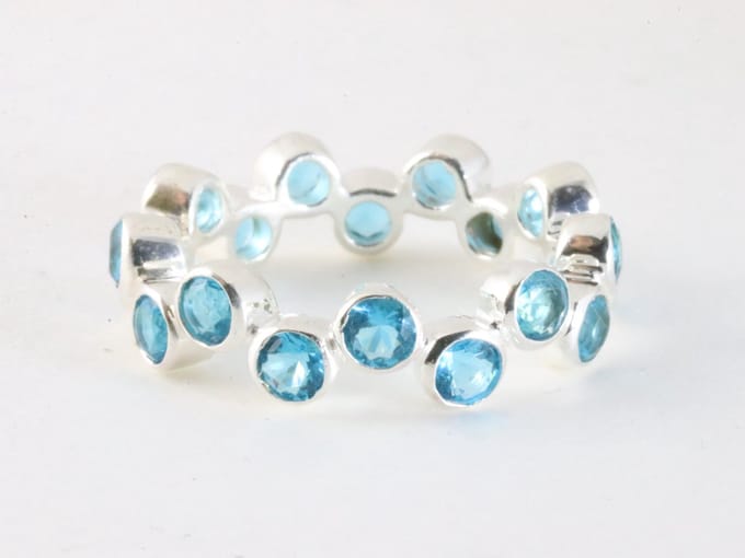 Zware zilveren ring met blauwe topaas - maat 19
