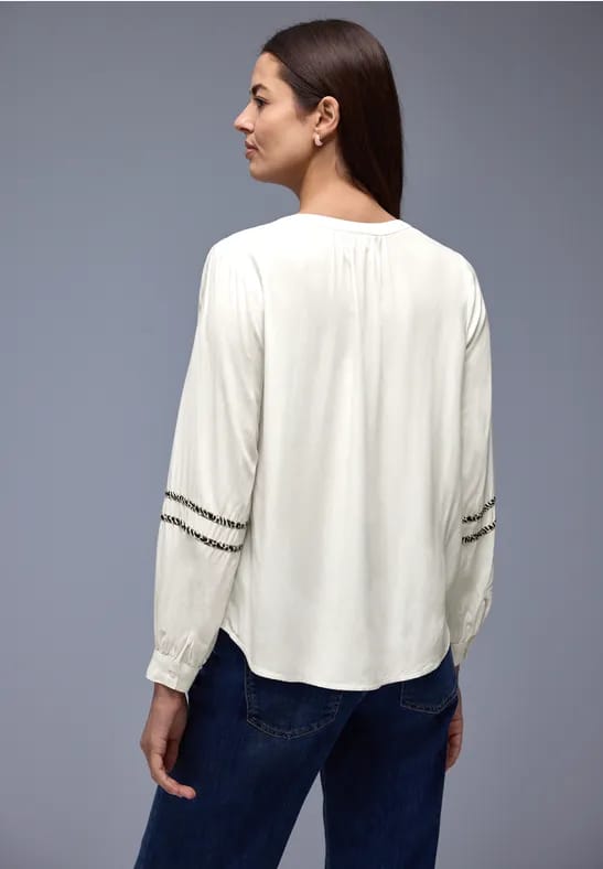 Tuniek met tapedetails