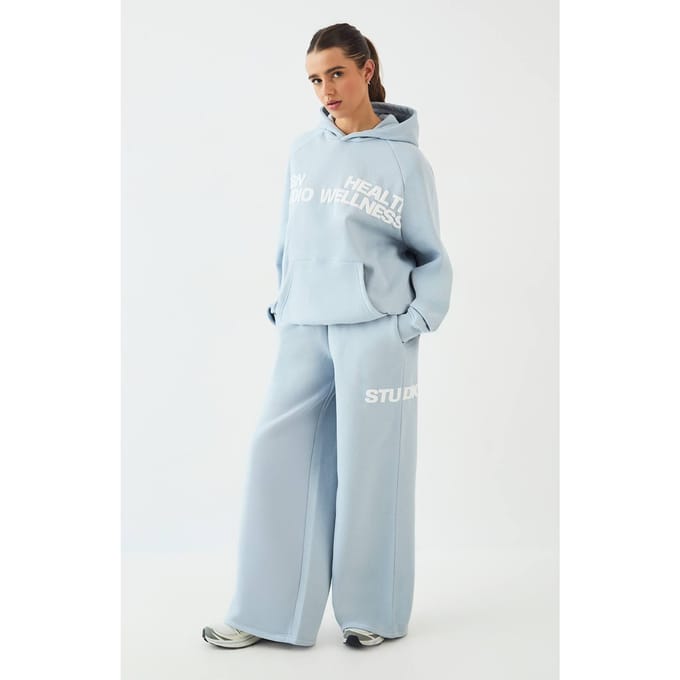 Dames Dsgn Studio Gezondheid En Wellness Bedrukt Trainingspak Met Capuchon | Lichtblauw | Maat: 3XL