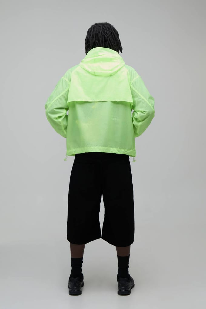 Oversized Boxy Glow In The Dark Transparante Cagoule Met Capuchon En Togglesluiting | Lime | Size Medium