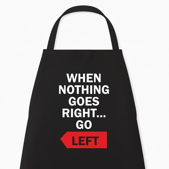 Keukenschort "When nothing goes right, go left" | Grappig Cadeau | Zwart