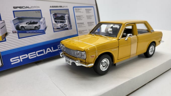 1971 Datsun 510 (Geel) 1/24 Maisto - Modelauto - Schaalmodel - Model auto