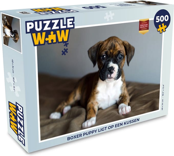 Puzzel Boxer puppy ligt op een kussen - Legpuzzel - Puzzel 500 stukjes
