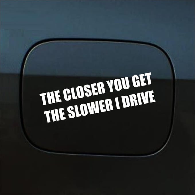 Bumpersticker - The Closer You Get The Slower I Drive - 4 X 14,8 - Wit