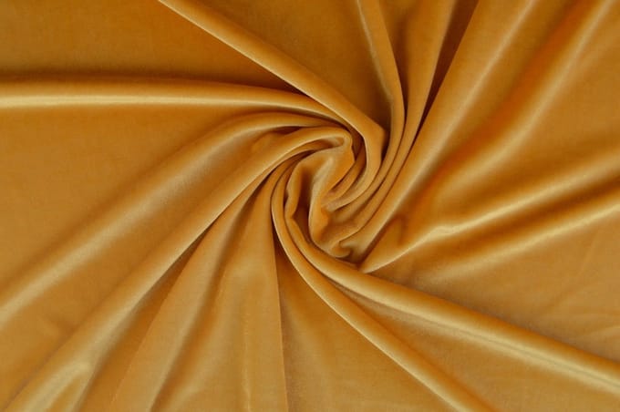 10 meter stretch fluweel - Okergeel - 93% polyester - 7% elastaan
