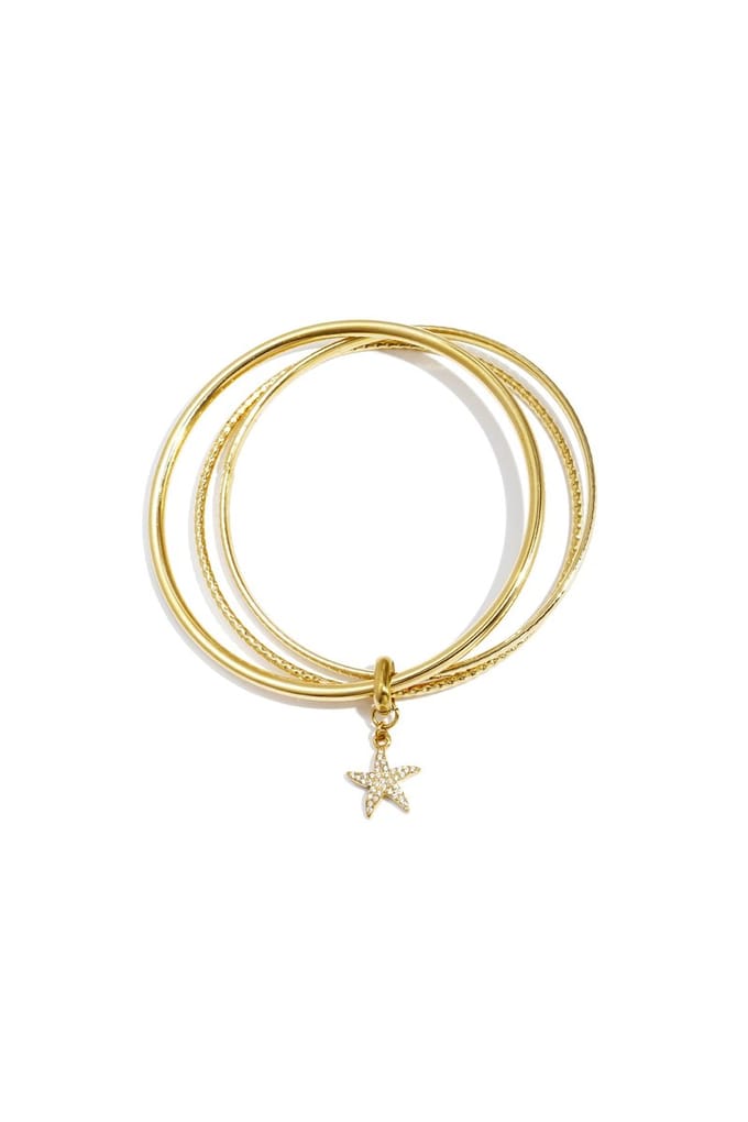 Bangles met hangende bloem charm - Goudkleur