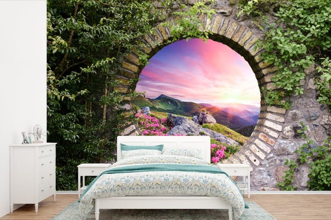 Behang - Fotobehang Landschap - Bloemen - Doorkijk - Berg - Breedte 600 cm x hoogte 400 cm
