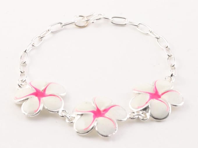 Zilveren schakelarmband met witte emaille bloemen