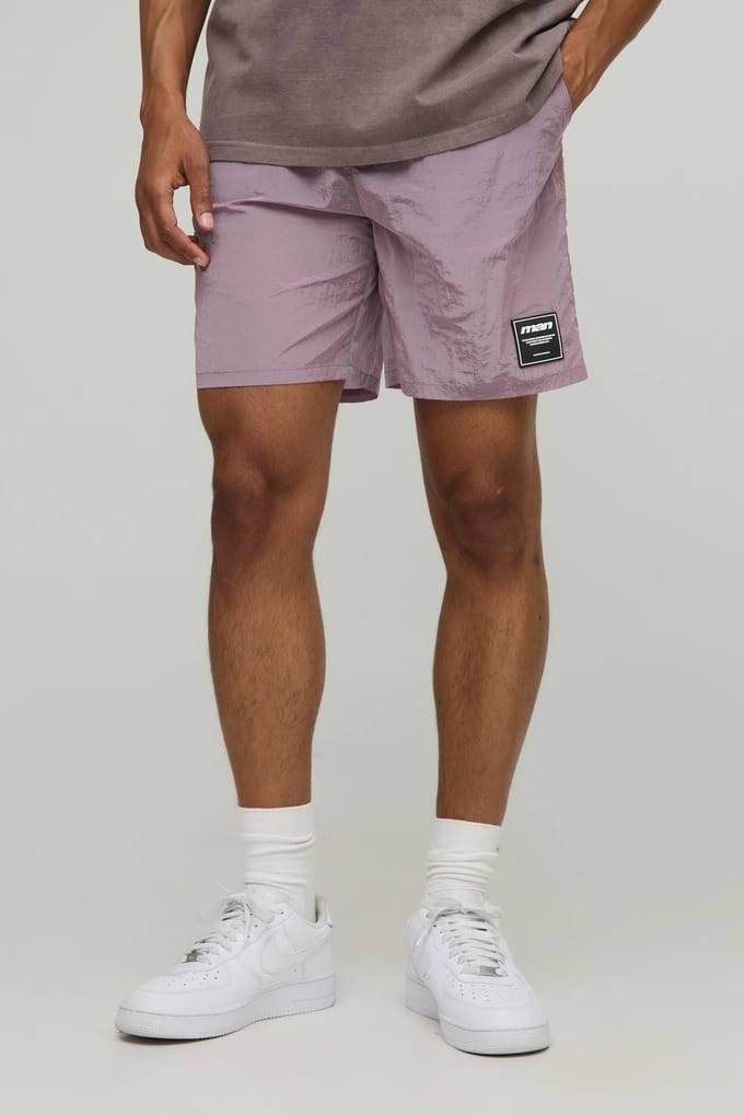 Relaxte pasvorm hoogglanzende gerimpelde nylonshorts | Pink | Size Medium