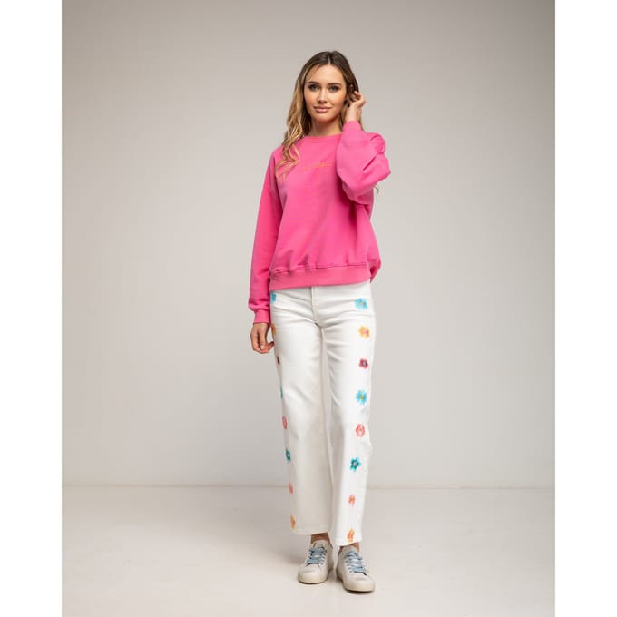 Straight fit jeans met geborduurde bloemen aan de voorkant.