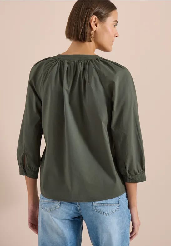 Blouse met 3/4 mouwen en gespleten hals in effen kleur