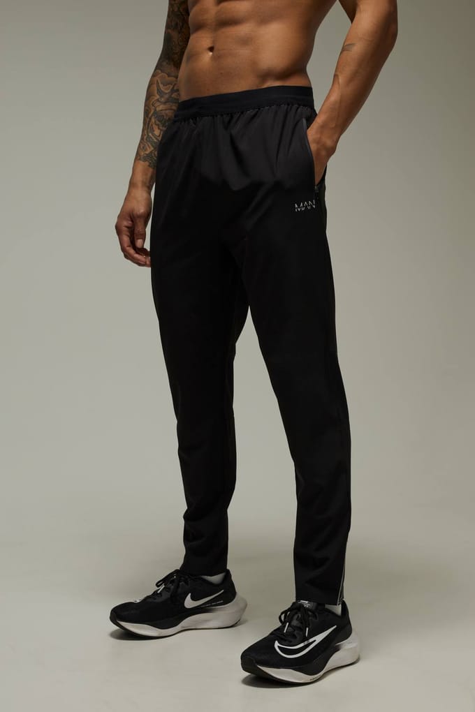 Heren Actieve Hardloop Geperforeerde Toelopende Jogger | Black | Size Medium