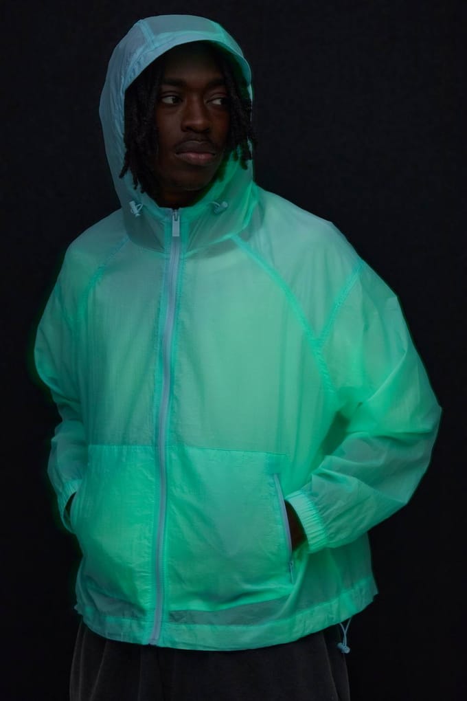 Oversized Boxy Glow In The Dark Transparante Cagoule Met Capuchon En Togglesluiting | Blue | Size Small