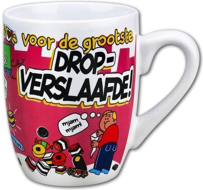 Mok beker drop verslaafde. Verslaafd aan drop.