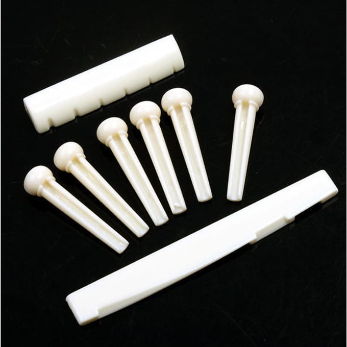 Un ensemble de broches de pont en os de guitare Folk, écrou de selle