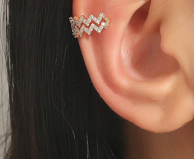 Wave ear cuff | goud gekleurd
