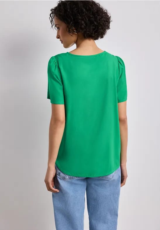 Blouse met ronde hals en korte pofmouwen