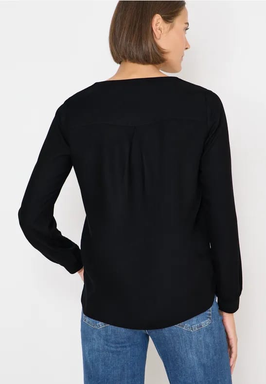 Blouse met glitterdetails