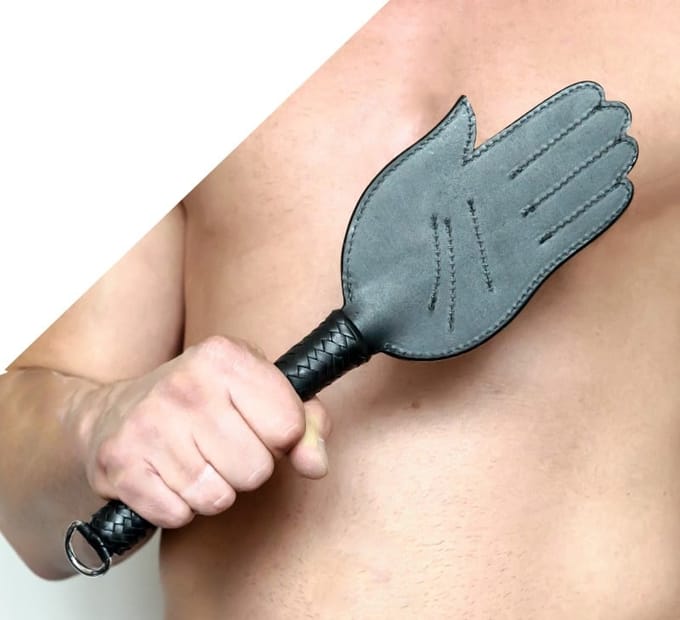 Lederen Paddle in Hand vorm