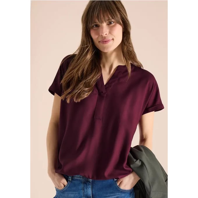 Blouse met korte mouwen en gespleten hals