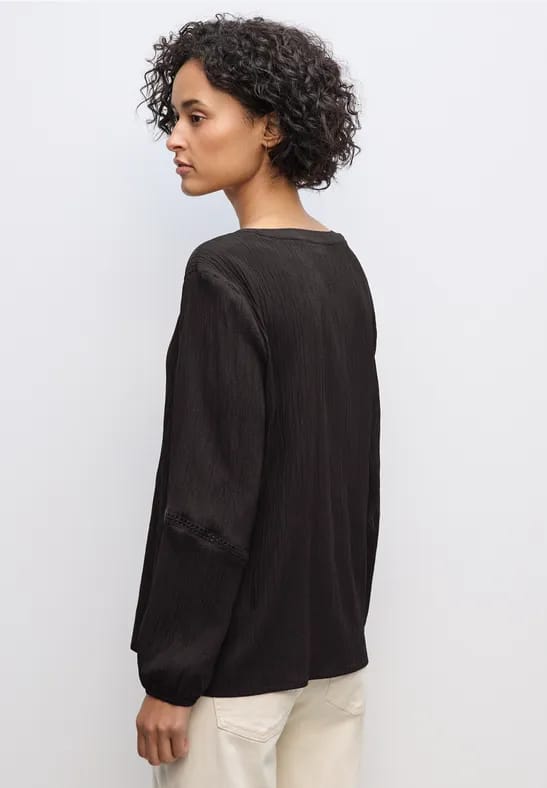 Tuniek met structuur en tape