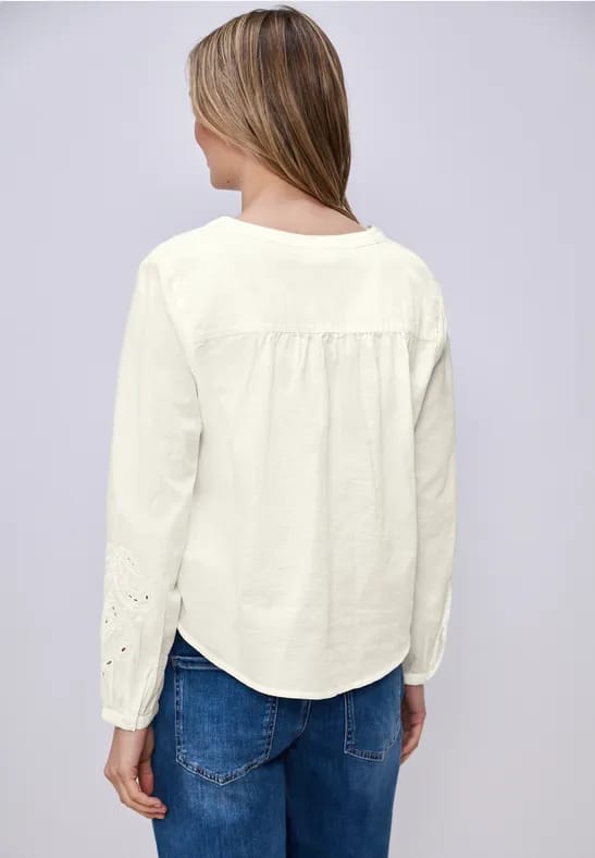 Blouse met V-hals en borduursel