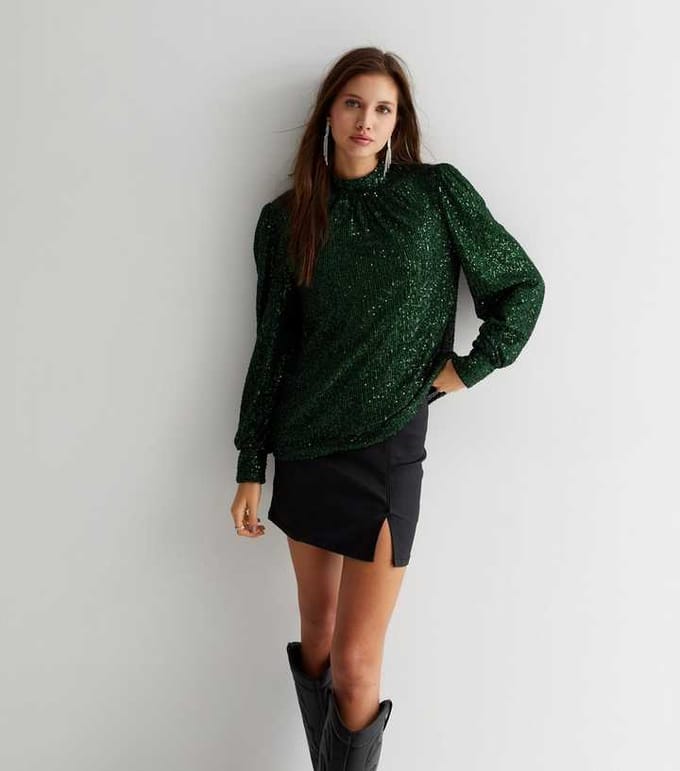 Loosefit blouse met hoge hals en pailletten