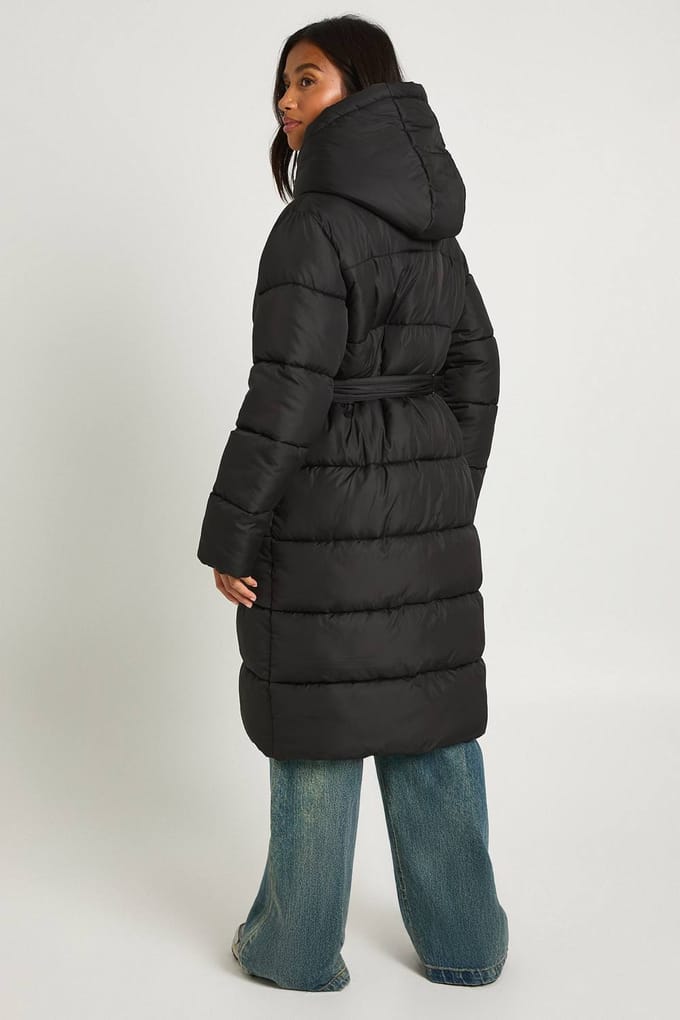 boohoo Dames Petite Longline Pufferjas met riem | Zwart | Maat: 38