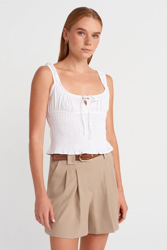 Getailleerde Cropped Mouwloze Blouse met Strikvoorkant