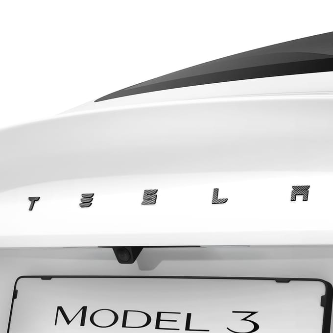 Spigen Tesla Rear Emblem Logo Full Cover - carbon - Tesla Model 3 2024