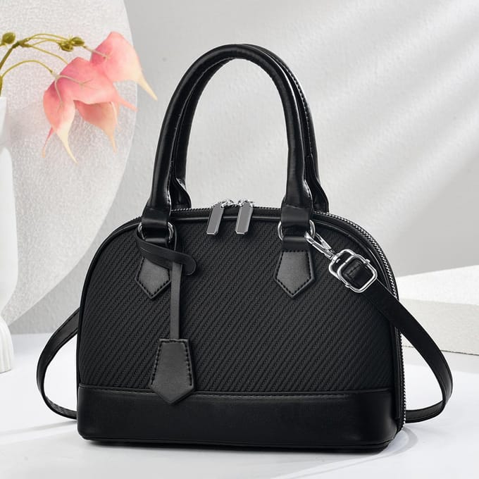 Nieuwe Patchwork Macaron Handtas met Hoge Uitstraling Canvas Textuur Eenvoudige Mode Schoudertas All-match Dames Tas . black