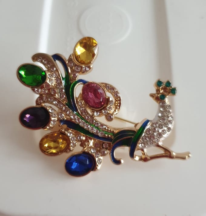 Zelto-Broche Pauw
