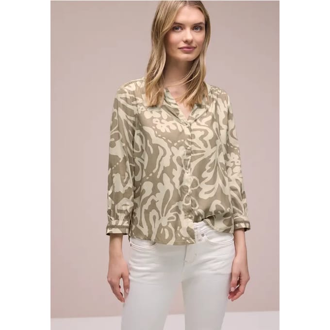 Blouse met 3/4 mouwen en getapete details