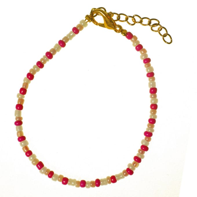 Armband rocaille kralen parelmoer/roze met goudkleurige sluiting