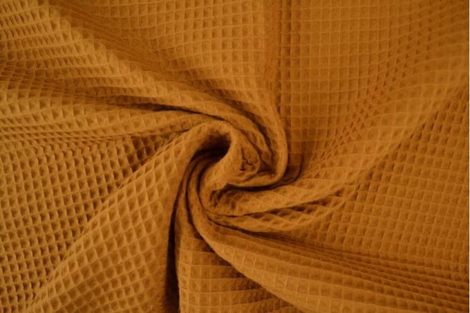 Wafelstof - 1 meter - Per meter - Donker okergeel - 150cm breed