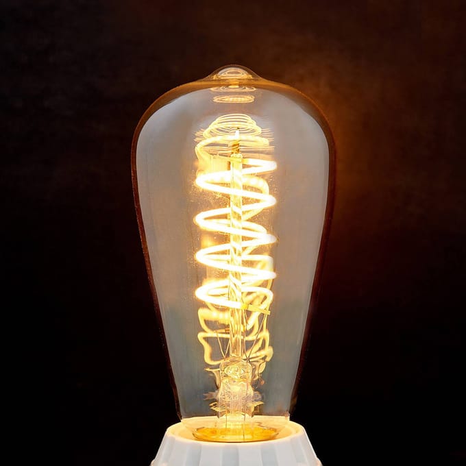 Lindby E27 LED-Rustika Curved Line 4W, 1.800K, amber