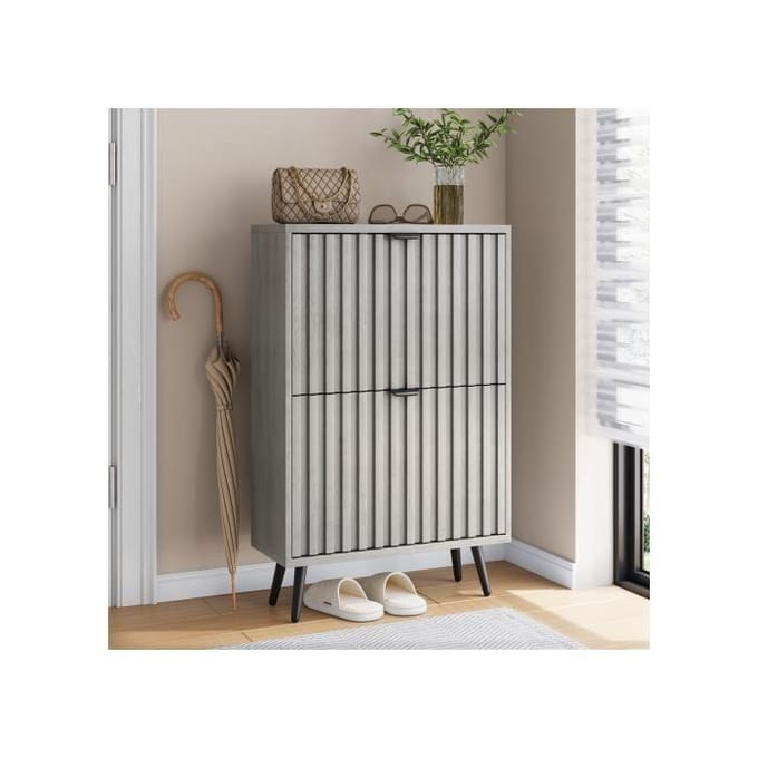 Een verborgen schoenenkast met een grijze nis van 60 cm en 2 klapladen.