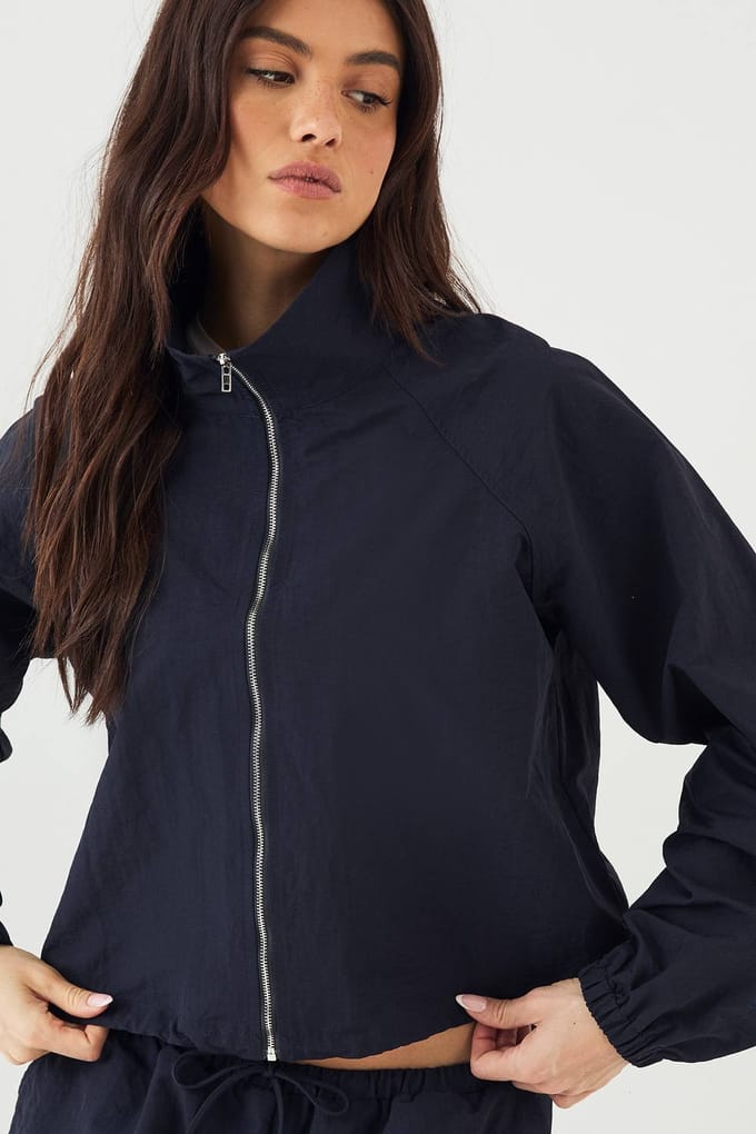 Dames DSGN Studio Funnel Neck Trainingsjack | Marineblauw | Maat: 2XL