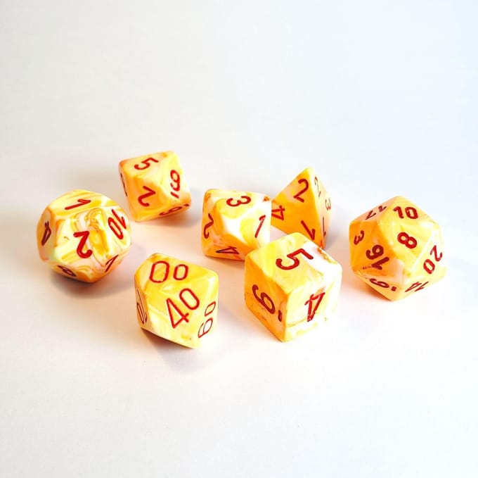Chessex Feestelijke Sunburst/rode Polydice Dobbelsteen Set (7 stuks)