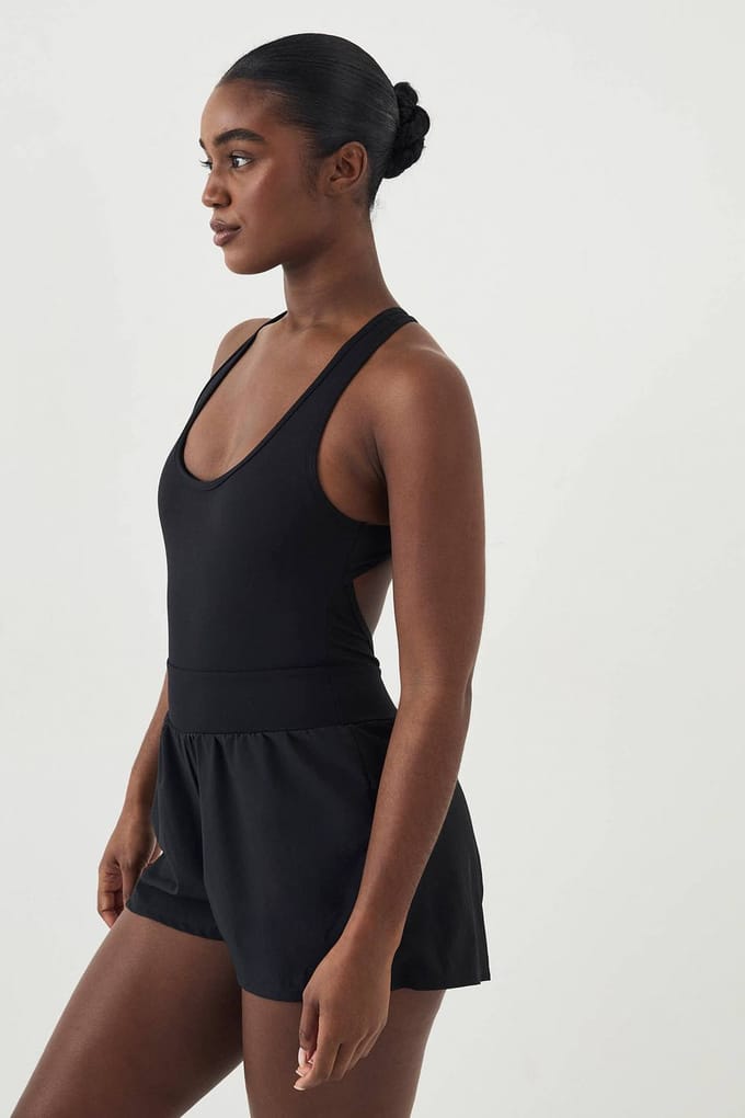 Dames DSGN Studio Cross Back Hardloop Unitard | Black | Maat: XL