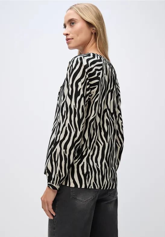 Gedessineerde raglan tuniek