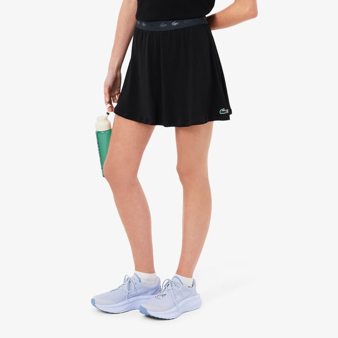 Uitlopende sport-rok met logodetail
