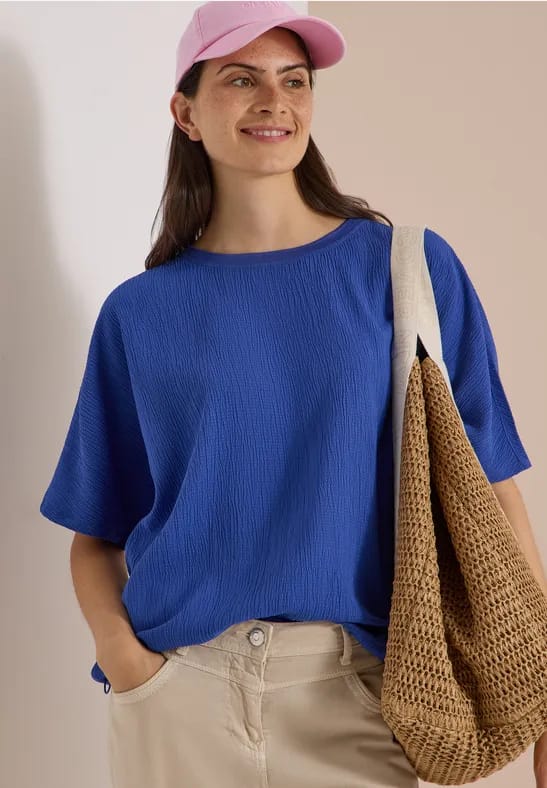 Blouse met afhangende schouders in effen kleur