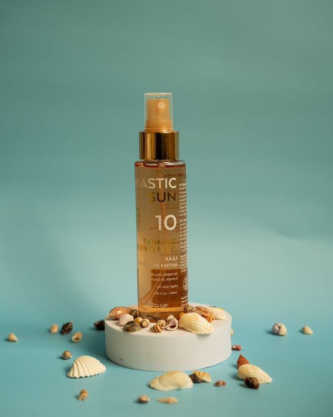 Tanning bronzer oil spf 10