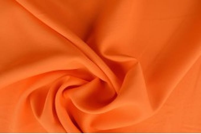 50 meter texture stof - Oranje - 100% polyester