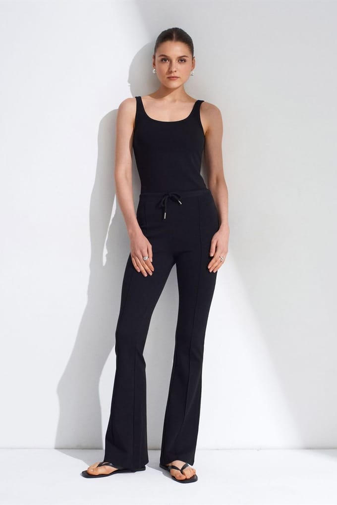 Mid-waist flare jersey broek met koordjes