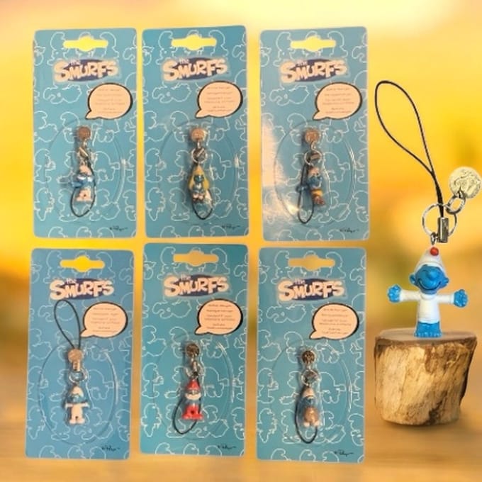 De smurfen - sleutelhanger set - 8 stuks - mini gelukspoppetjes -