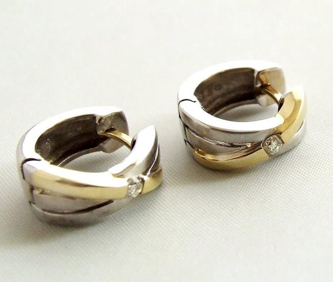 Bicolor gouden oorbellen met diamant