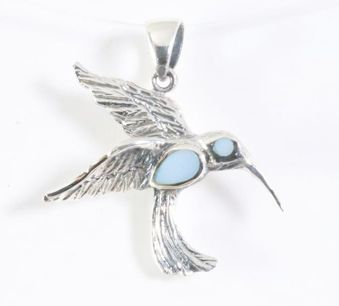 Zilveren kolibrie hanger met blauwe schelp